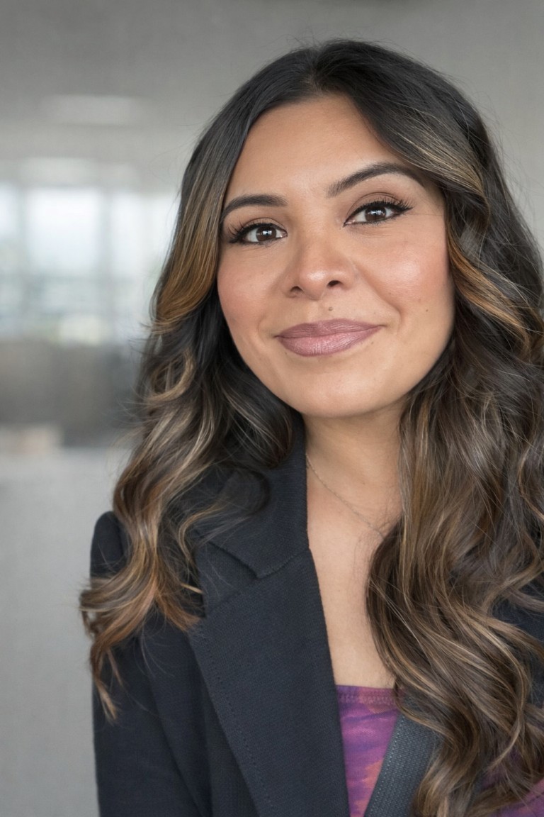 Headshot of employee Genesis Bedoy